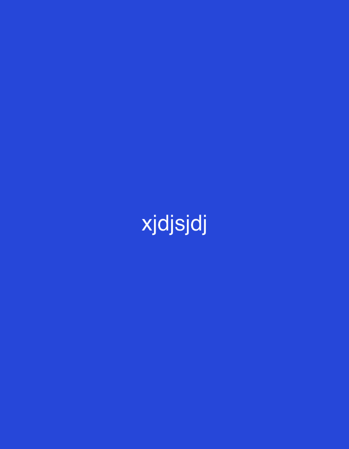 The image is a solid blue background with the text "xjdjsjdj" in white located in the center. There is no discernible location, people, objects, or actions present. The text is the only subject in the image.