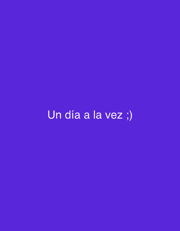 The image displays a simple, minimalist design featuring white text centered on a solid purple background. The text reads "Un día a la vez ;)", which translates from Spanish to "One day at a time ;)". Following the phrase, there is a winking emoticon. No people, objects, or specific activities are depicted. The background is a uniform, vibrant shade of purple, without any discernible textures or patterns. There are no visual cues to indicate the time of day, weather, or a specific location within the image itself. The overall impression is one of a motivational or uplifting message presented clearly and concisely. The location context provided for this media file is Tinaquillo, Venezuela.