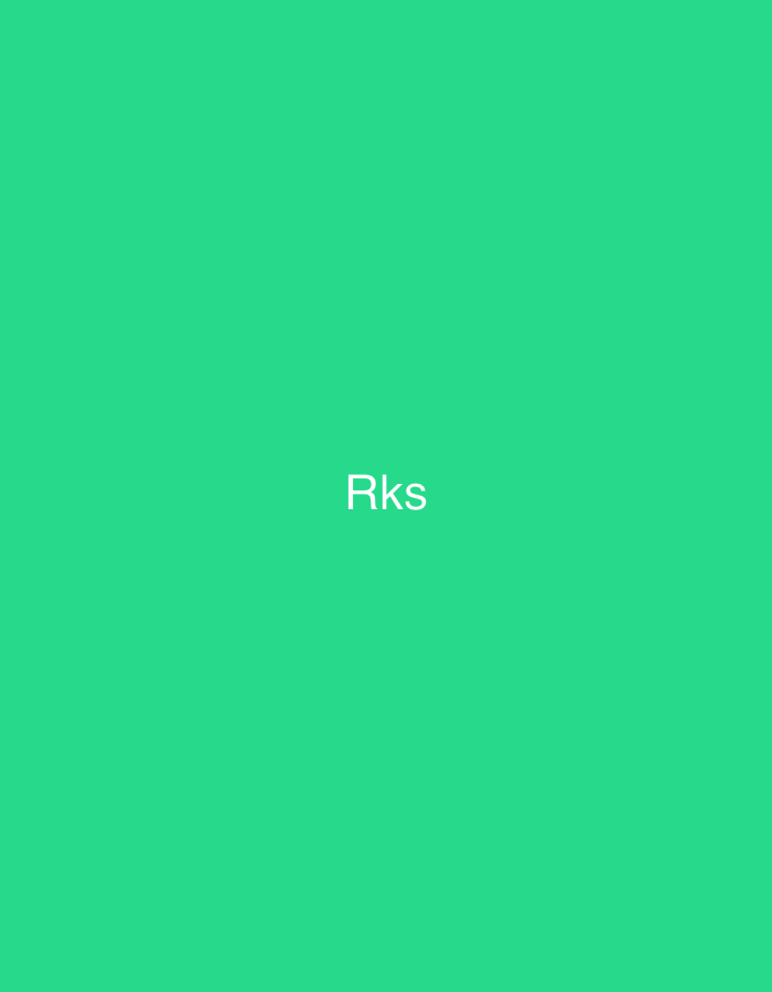 The image displays a solid, vibrant green background. Centered horizontally and vertically on this background are the three uppercase, sans-serif letters "Rks" rendered in white. No people, specific objects, actions, or interactions are present. The environment is an abstract, monochrome color field. There are no discernible elements within the image indicating a specific geographical location, including the city of Casablanca, Morocco.