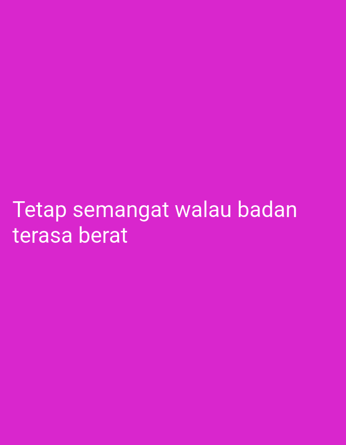 The image is a vertical, medium shot of a plain pink background with white text. The text reads "Tetap semangat walau badan terasa berat" which translates to "Keep your spirits up even though your body feels heavy." There are no people, objects, or environmental details visible in the image. The image does not contain any information that would allow for its location to be determined as Depok, Indonesia.