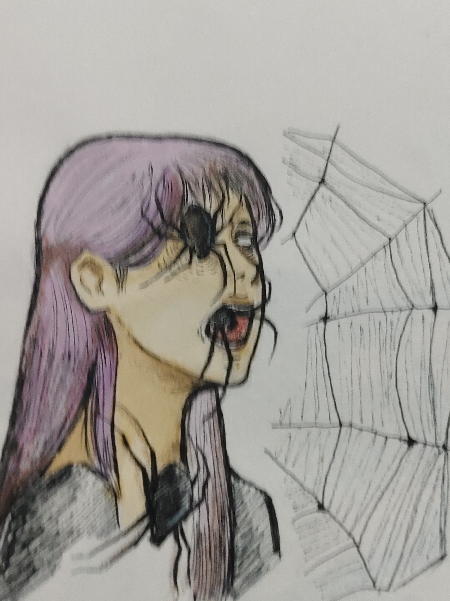 The image is a colored drawing on white paper, depicting the head and upper torso of a person in profile, facing right. The person has long, straight hair, rendered in shades of purple and dark grey. Their skin tone is a light yellowish-beige. The visible right eye is entirely white, with no discernible iris or pupil. The mouth is open, showing a dark interior and some reddish-pink coloration.
A large, black-bodied spider is positioned on the right side of the person's face, partially obscuring the eye and extending onto the cheek with several legs. Another large, black spider with prominent legs is shown emerging from the person's open mouth. A third, smaller black spider is visible on the person's left shoulder. The person is wearing a dark grey or black garment. To the right of the person, a large spiderweb is drawn with black outlines and grey shading, featuring radial lines and concentric segments.
The image is a piece of art and does not depict a specific real-world location in Davao City, Philippines, or any other geographical area.