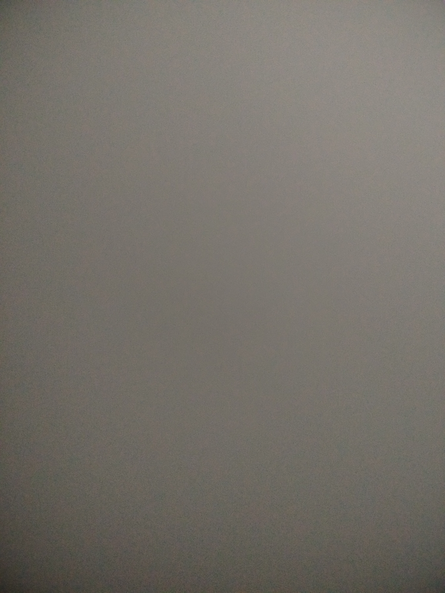 The image is a solid gray background. There are no identifiable people, subjects, objects, actions, interactions, or environmental details. Therefore, it is impossible to locate it in Yerevan, Armenia, or anywhere else.
