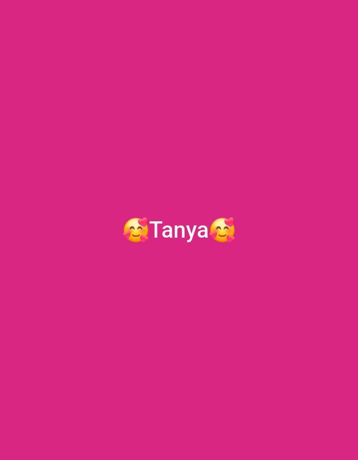 A pink background is featured with the word "Tanya" in white text. Flanking the word are two yellow emojis with blushing cheeks and hearts floating around their faces.