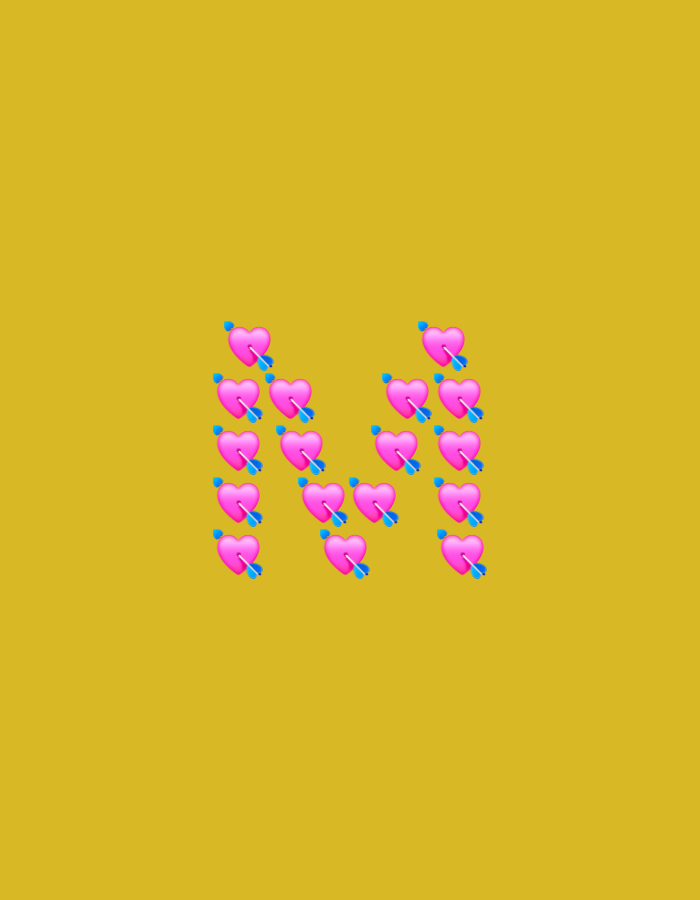 The image displays the letter "M" constructed from heart-with-arrow emojis on a mustard-yellow background. There are no people, interactions, or environmental cues to suggest a location in Yerevan, Armenia.