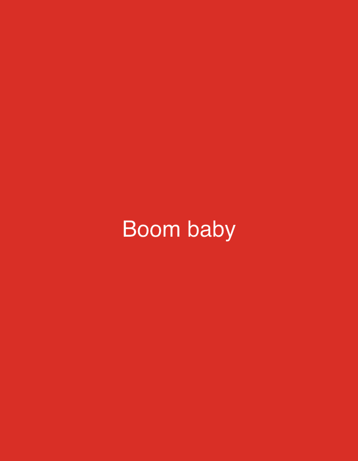The image displays a simple graphic design featuring a solid, vibrant red background. Centered on this red field, the phrase "Boom baby" is rendered in clear, white, sans-serif uppercase and lowercase lettering. No other subjects, objects, or activities are depicted. The image lacks any visual cues that indicate a specific time of day, weather conditions, or a particular physical location.