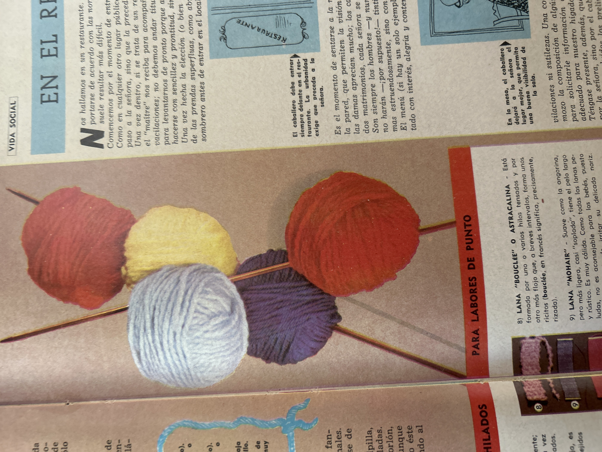 The image shows a portion of a vintage magazine page. The left side of the page features a heading "HILADOS" (Yarns) above two numbered entries, 8 and 9, describing different types of yarn with small swatches of fabric. These entries are partially obscured by the spine of the magazine or a crease. A section of the magazine page to the right displays a photograph of several balls of yarn in red, yellow, purple, and light blue, with knitting needles piercing through them. The top right of the page has a heading "VIDA SOCIAL" (Social Life) above a larger section of text with a bold title "EN EL RE" (In the Restaurant). The text discusses etiquette in restaurants, mentioning caballeros (gentlemen) and señoras (ladies). There is also a small illustration of a restaurant menu. The text and image are printed on aged paper, suggesting the magazine is old. There is no indication of the city of Tacarigua, Venezuela, or any specific geographical location within the visible content of the image.