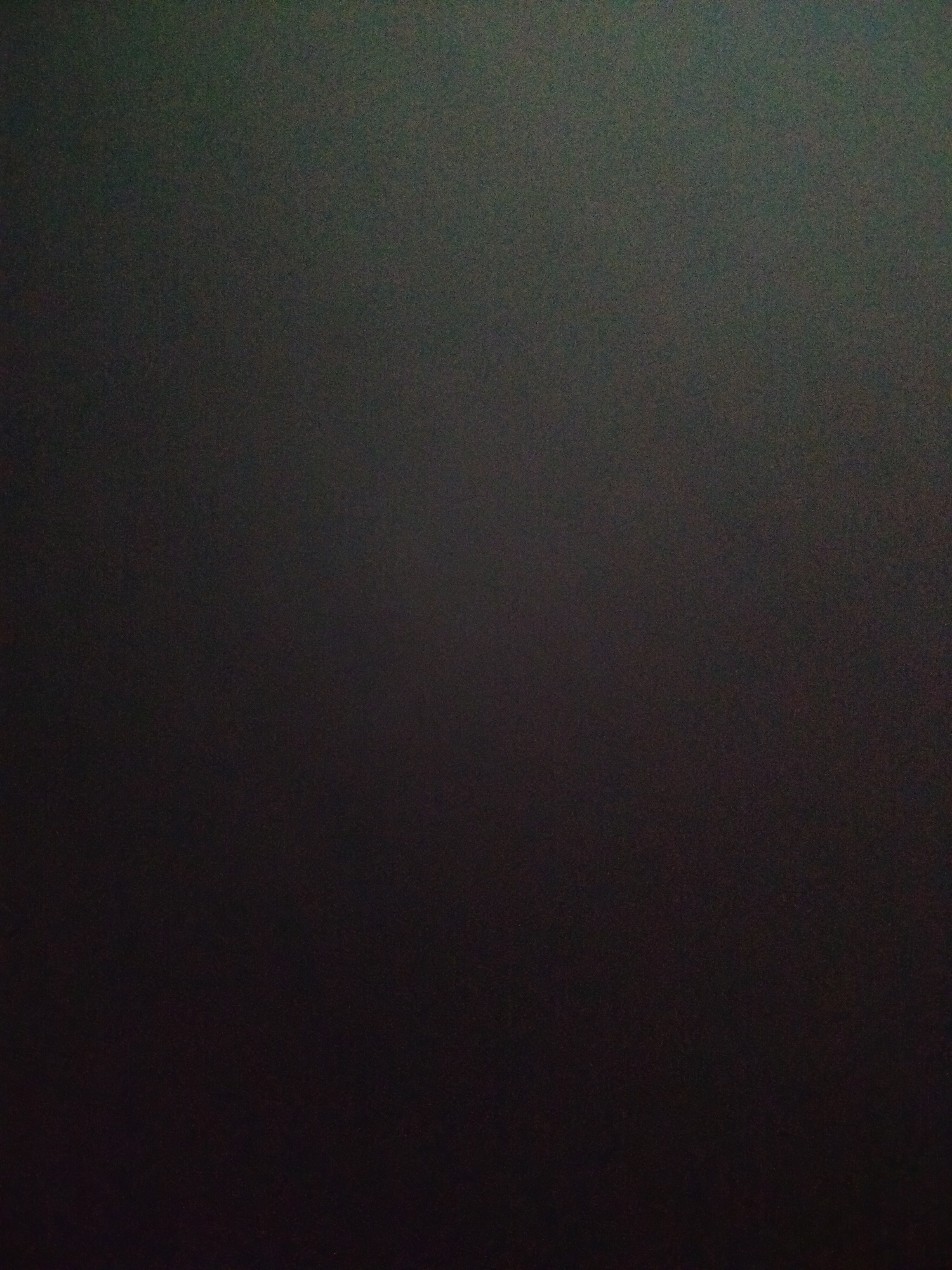 The image is a dark, blurry, and underexposed photo. It's impossible to provide any specific details about location, people, objects, or actions due to the lack of visibility. It primarily consists of varying shades of black and dark gray. There's no evidence of a specific location in Yerevan, Armenia, or any other identifiable elements.