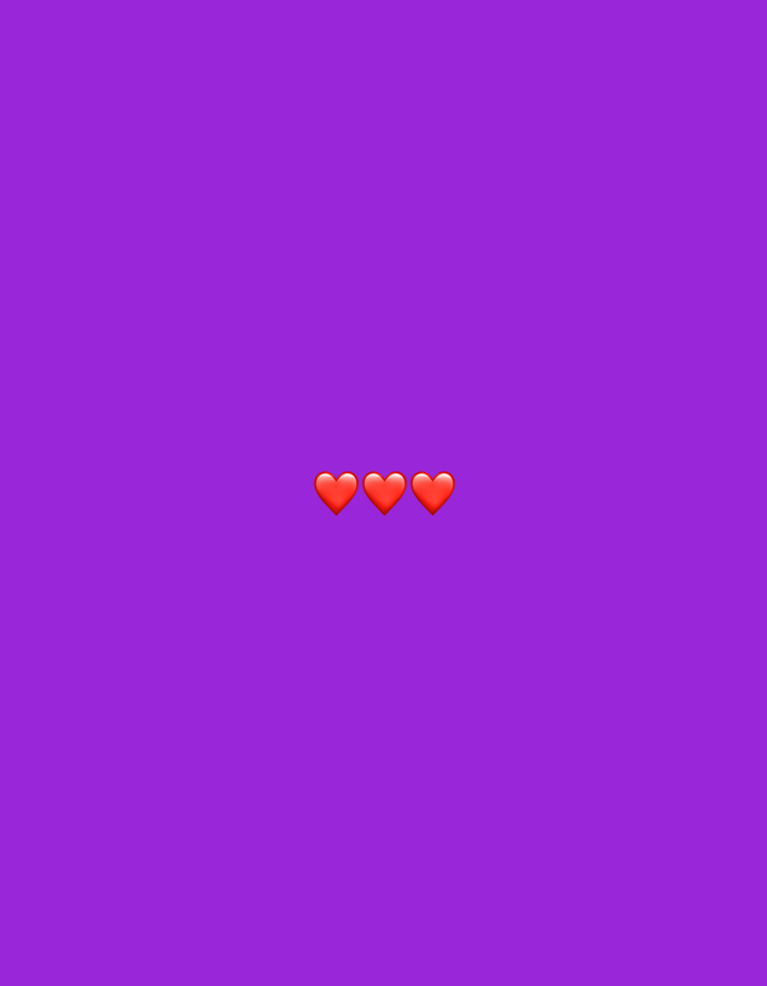 Three red heart emojis are centrally aligned against a solid purple background. The image does not contain any discernible elements related to the city of Meknes, Morocco.