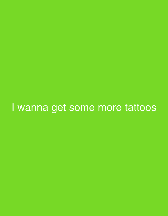 The image features white text centered against a solid, vibrant green background. The visible text reads: "I wanna get some more tattoos". There are no people or objects depicted, nor is there any discernible scene or setting beyond the colored backdrop and the superimposed text. The image does not provide any visual cues regarding the time of day, weather, or specific location within Sevenoaks, United Kingdom, despite the provided context. The message itself conveys a personal desire or intention.