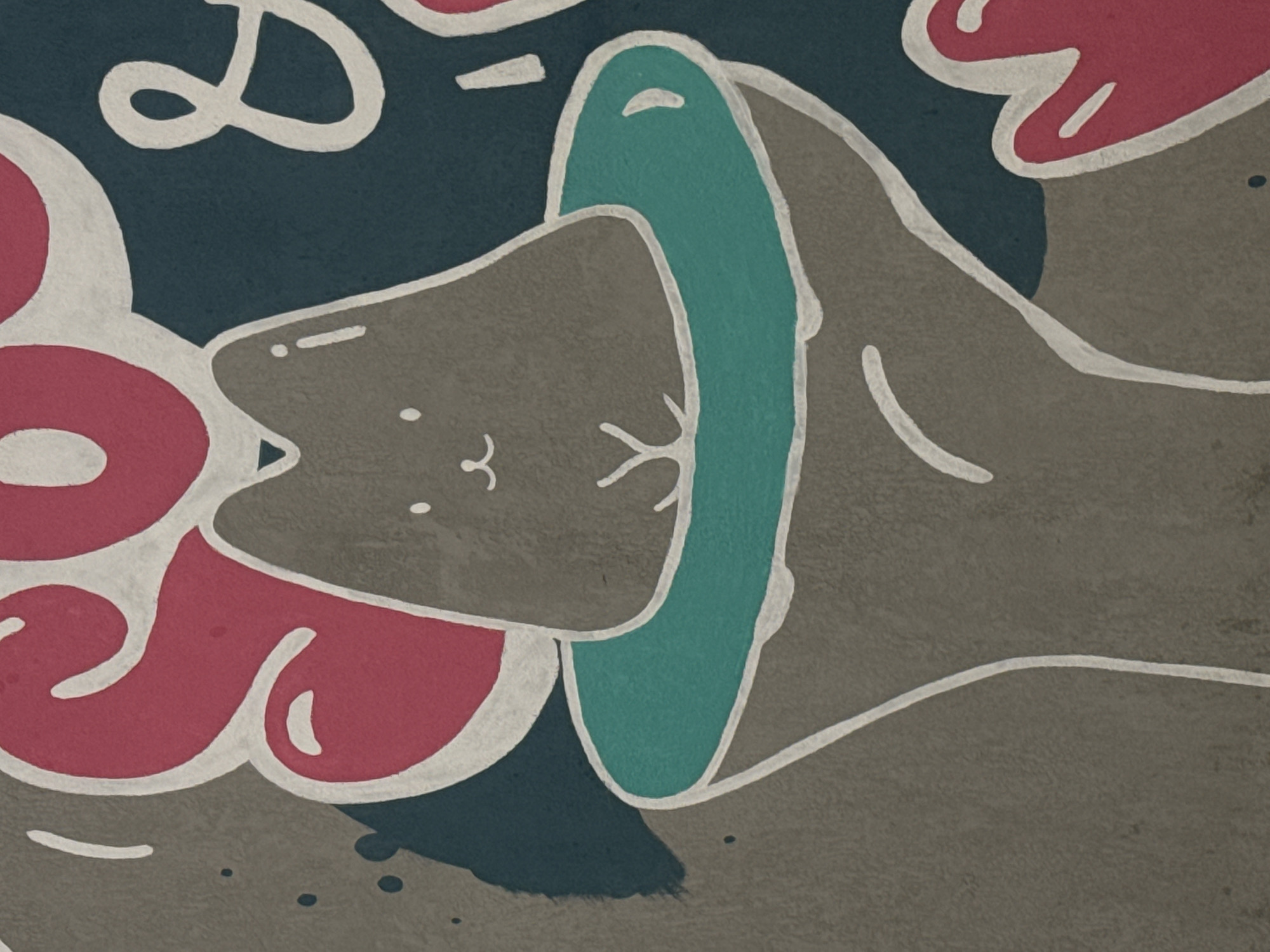 The image shows a stylized, graphic-like representation of a cat's head resting inside a hand. The cat, depicted in shades of gray, has a minimal face with dots for eyes, a small curved line for a mouth, and whiskers represented by a "Y" shape. A turquoise collar surrounds the cat's neck. The hand holding the cat is colored in a darker shade of gray. Pink, blob-like shapes with white outlines surround the cat's head, possibly representing flowers or abstract decorations. The background alternates between dark blue and gray. The overall style suggests a mural or street art. Location: Mozhvai, Russia.