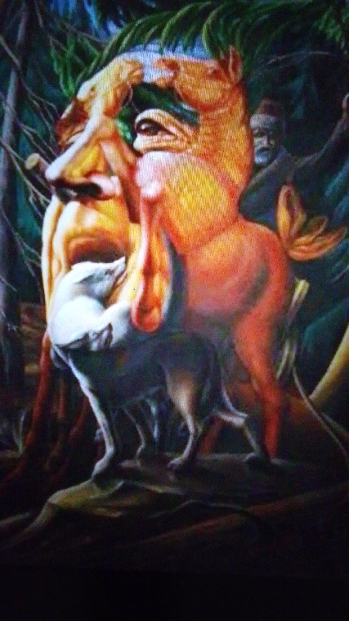 The image is a painting depicting an optical illusion. In the foreground, a white animal, possibly a fox or a dog, is being carried by a larger, orange-colored animal that resembles a horse. The figures are positioned in a forest-like environment with dark green foliage and brown tree trunks.
The illusion creates a secondary image: the negative space between the figures and the contours of their bodies form the profile of a human face. Specifically, the white animal's body forms the nose, and the orange animal's body forms the jawline and chin. In the background, to the right, the dark shape of another human figure with glasses and a beard can be seen, partially obscured by foliage.
There is no discernible information within the image that relates to the city of Aznakayevo, Russia. The scene is entirely fictional and artistic.