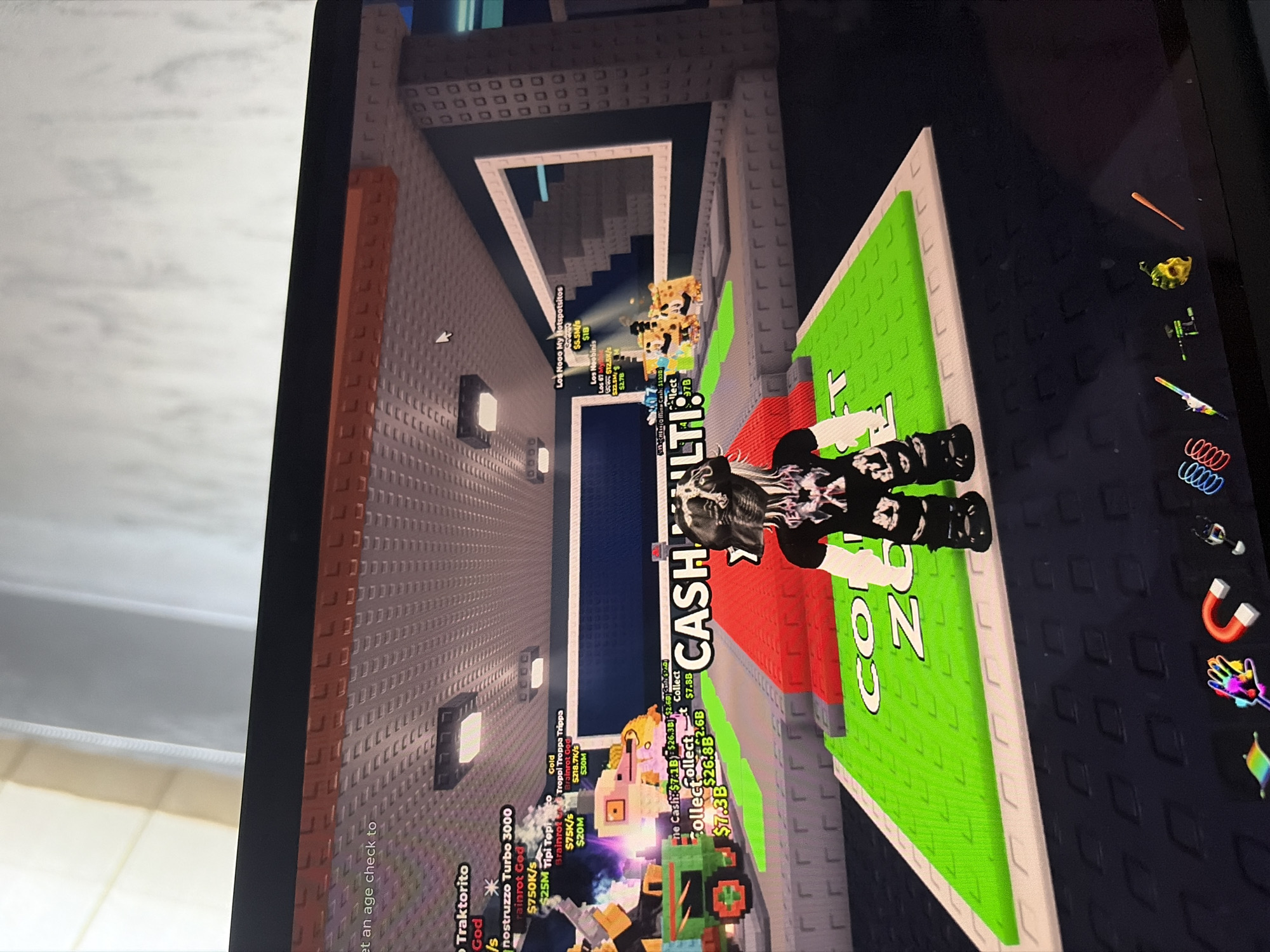 The image depicts a screen displaying a Roblox game. The game's interface includes elements such as a player avatar, in-game currency information, and various structures and characters. The environment is a virtual world, potentially a simulation or a game setting with interactive elements and virtual economy mechanics. The game appears to be a tycoon or simulation-style game, with players managing resources and collecting cash.