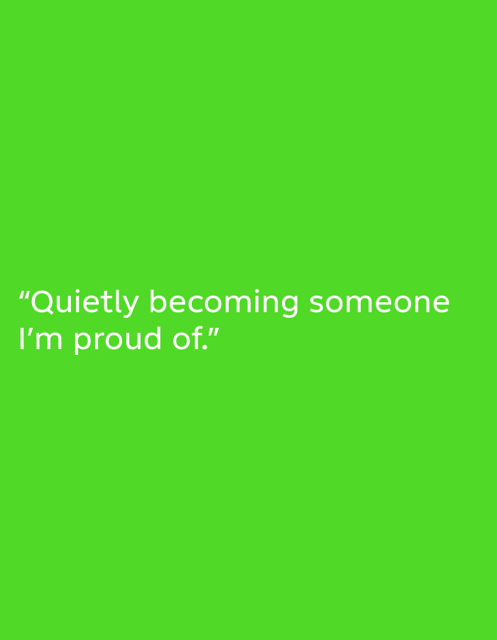 The image is a photograph of a bright green background with white text overlaid. The text reads, "Quietly becoming someone I'm proud of." The text is centered on the left side of the image. There are no people, objects, or environmental details visible in the image, other than the background and the text. The location of Muaro Jambi, Indonesia is not visually represented in the image.