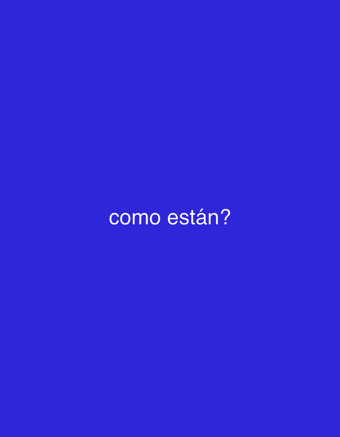 The image displays a minimalist design featuring a solid royal blue background. There are no visible subjects, objects, or specific scene elements other than the color field. Centered horizontally and vertically on this blue background is white text in a sans-serif font, which reads "como están?". This phrase translates from Spanish to "how are you?" or "how are you all?". There is no activity or event taking place. The image itself provides no visual cues regarding time of day, weather, or specific location details, beyond the given context of Santa Ana, Venezuela, which is not visually represented in the media file.