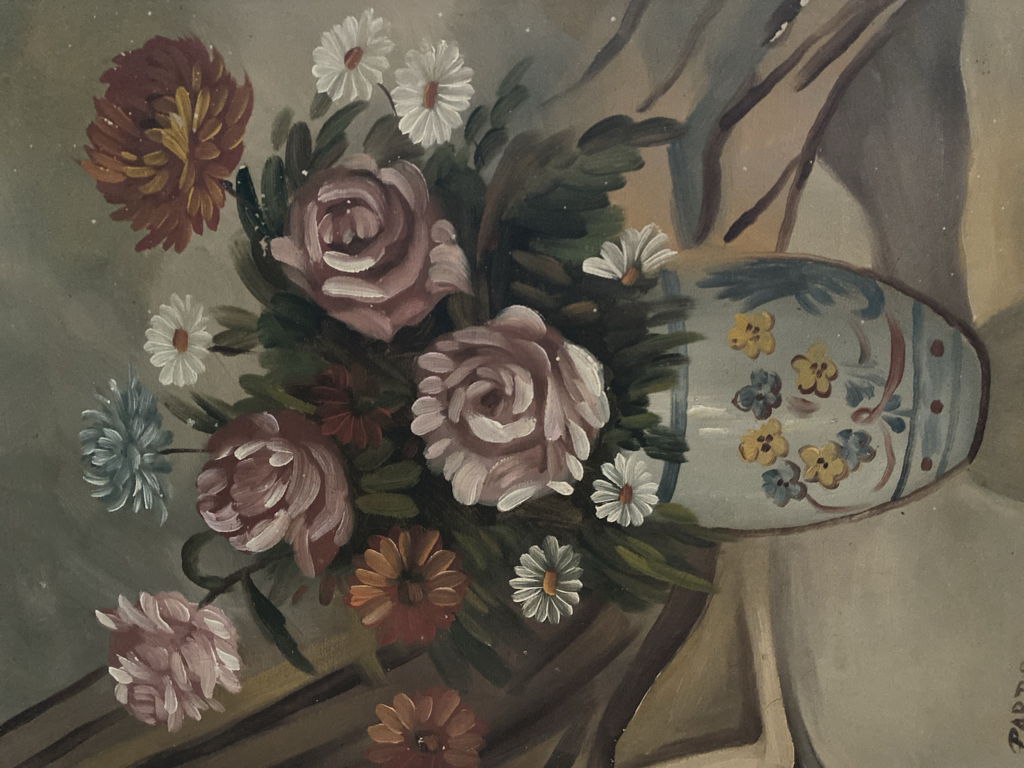 The image is a close-up of a still-life painting. The subject is a bouquet of flowers in a vase. The flowers include roses in shades of pink and red, white daisies, and other colorful blooms. The vase is decorated with yellow and blue floral patterns. The painting appears to be old, with a muted color palette and visible brushstrokes. The location is Tinaquillo, Venezuela, is not evident in the image itself. The scene is an indoor setting, inferred from the still-life nature of the subject. There are no people visible.