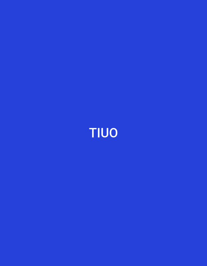 The image displays a solid, vibrant blue background. Centered horizontally and vertically on this blue field is the word "TIUO," rendered in white, uppercase sans-serif letters. No people, identifiable objects, or environmental features are visible. The scene, while described as being in Casablanca, Morocco, contains no visual elements or contextual information that would identify or connect it to that city or any specific geographic location. The entire image consists solely of the uniform blue background and the white text.