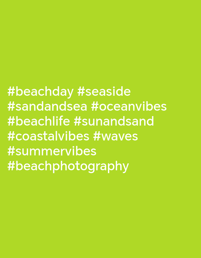 The image is a green background with white text. The text lists several hashtags: #beachday #seaside #sandandsea #oceanvibes #beachlife #sunandsand #coastalvibes #waves #summervibes #beachphotography. There are no people, objects, or specific environmental details visible in the image, and therefore no connection to Vityazevo, Russia can be made.