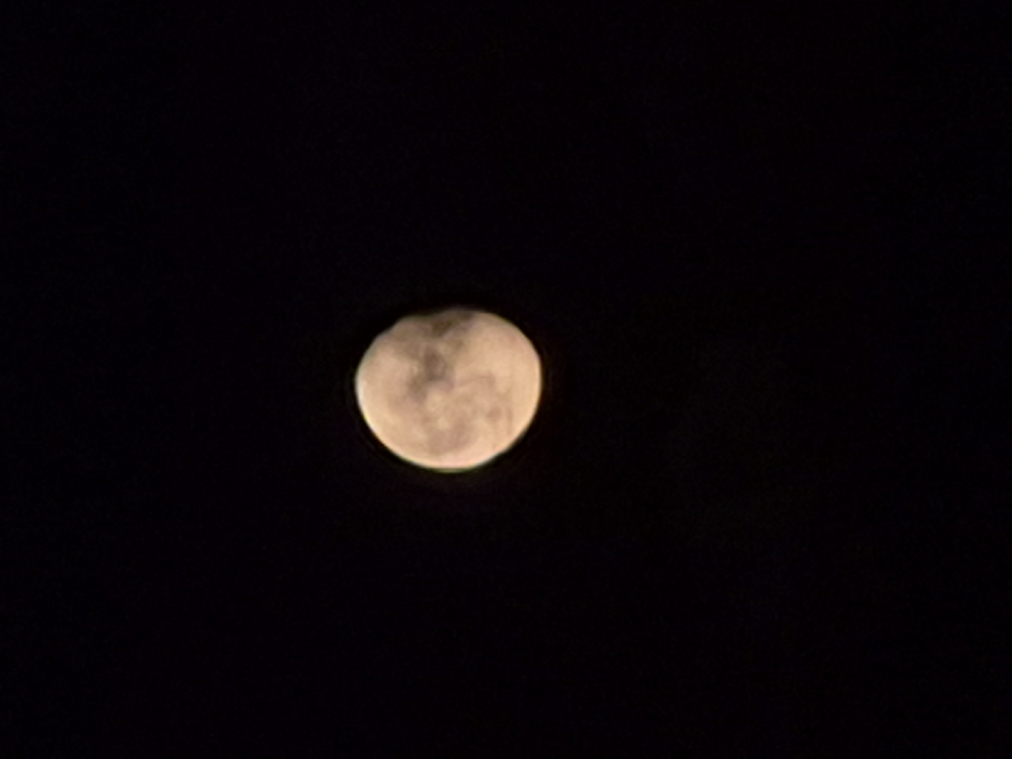 A full moon is visible in a black sky. The moon is illuminated and shows some surface detail, appearing as a sphere with variations in brightness and texture. The image is a close-up of the moon against a dark background, with no other objects or elements present. There is no indication of a city or any specific location within Estonia.