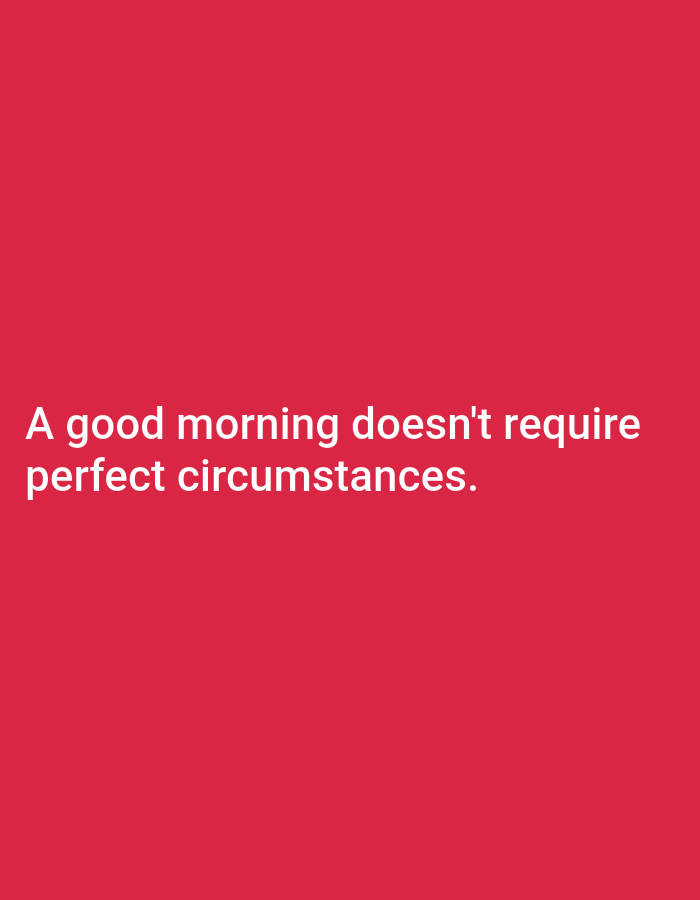 The image contains white text on a bright red background. The text reads: "A good morning doesn't require perfect circumstances." There are no people, subjects, objects, actions, interactions, or environmental details present in the image. The location in the city of Tebuwung, Indonesia is not visible or relevant to the content of the image.