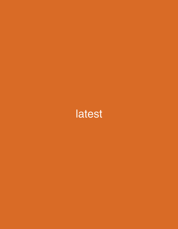 The image is a simple graphic with an orange background and the word "latest" in white text centered on the screen. There is no discernible location in a city, nor are there any people, subjects, objects, or actions depicted.