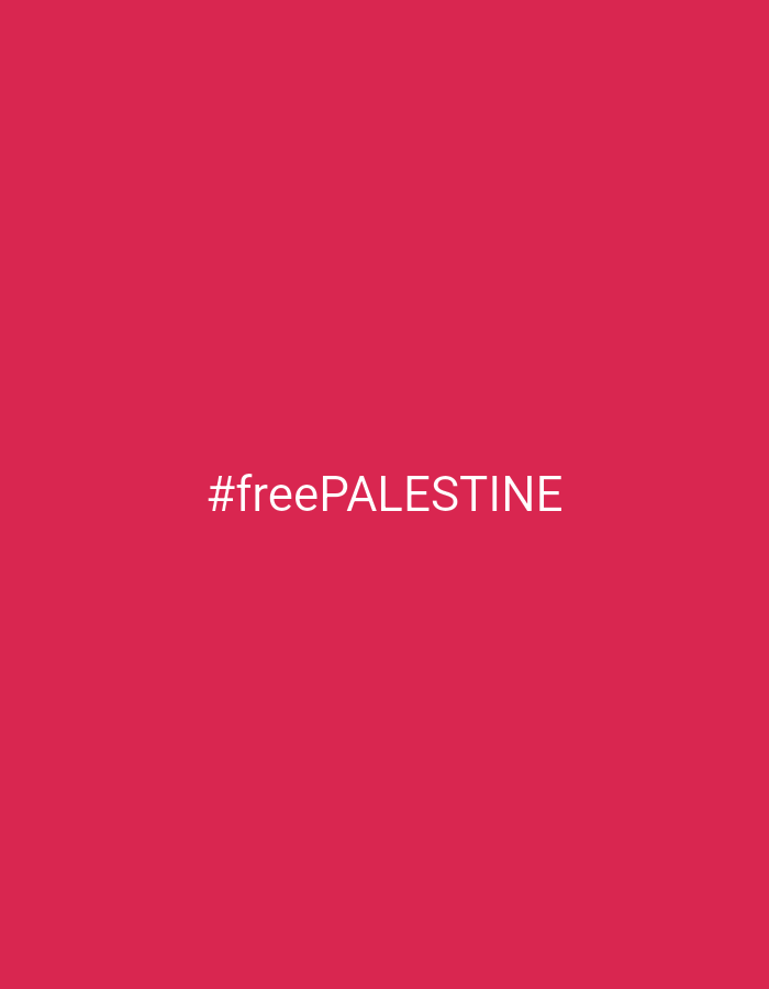 The image is a plain, pink background with the text "#freePALESTINE" centered in white. There are no other objects, people, or environmental details present in the image. Therefore, it is impossible to determine the location in the city of Pagar Alam, Indonesia, or any other geographical context.