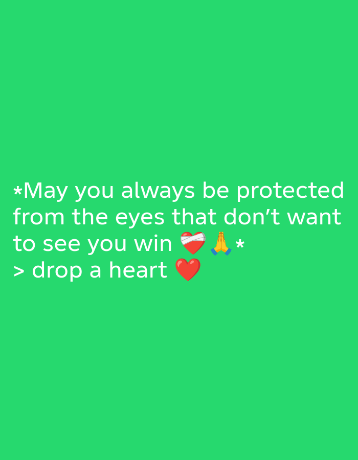 A text overlay is displayed on a bright green background. The text reads "*May you always be protected from the eyes that don't want to see you win > drop a heart". There are three emojis placed after the word "win": a red heart with a white bandage, a pair of praying hands, and an asterisk. Another red heart emoji is placed after the word "heart".