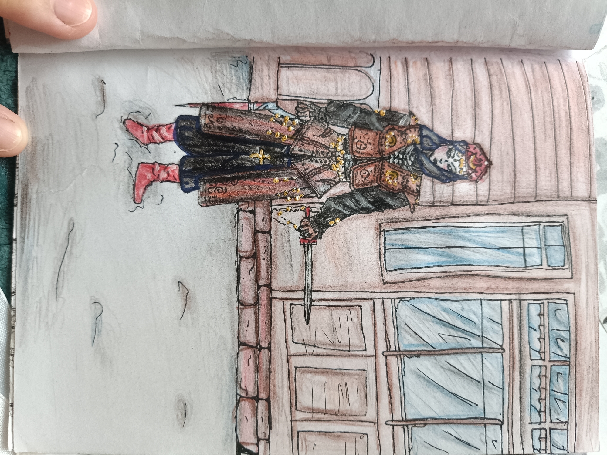 The image depicts a drawing of a person in historical attire, standing outside a building with wooden siding and windows. The person is wearing a dark hooded cloak, a richly decorated brown and gold tunic, and red boots. They are holding a sword in their right hand. The building has a brick foundation and the windows are outlined in brown with blue panes. The scene appears to be set on a grey, possibly snowy ground with a few dark lines suggesting scattered debris or shadows. The style is illustrative, with colored pencil or watercolor. The location is not specified in the image itself.