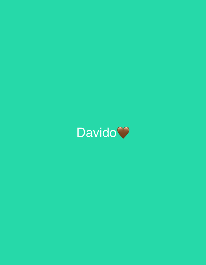 The image shows the word "Davido" written in white text with a brown heart emoji next to it, centered on a teal background. There are no people, objects, actions, or interactions depicted. The location in Ado, Nigeria is not discernible from the image.