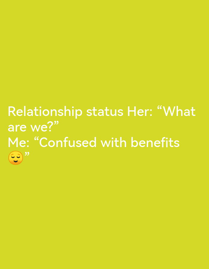 The image is a screenshot of a social media post with a yellow background. White text reads: "Relationship status Her: 'What are we?' Me: 'Confused with benefits' 😊". There is no indication of Ikorodu, Nigeria.