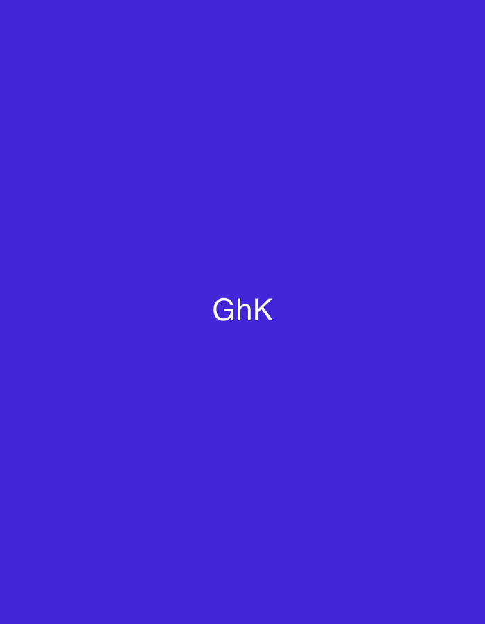 This image features a uniform, solid royal blue background. Centered horizontally and vertically in the frame is the white text "GhK", rendered in a clean, sans-serif font. The scene, contextualized in the city of Casablanca, Morocco, is devoid of any other discernible subjects, objects, people, actions, interactions, or specific environmental details beyond the abstract color field and the textual element.