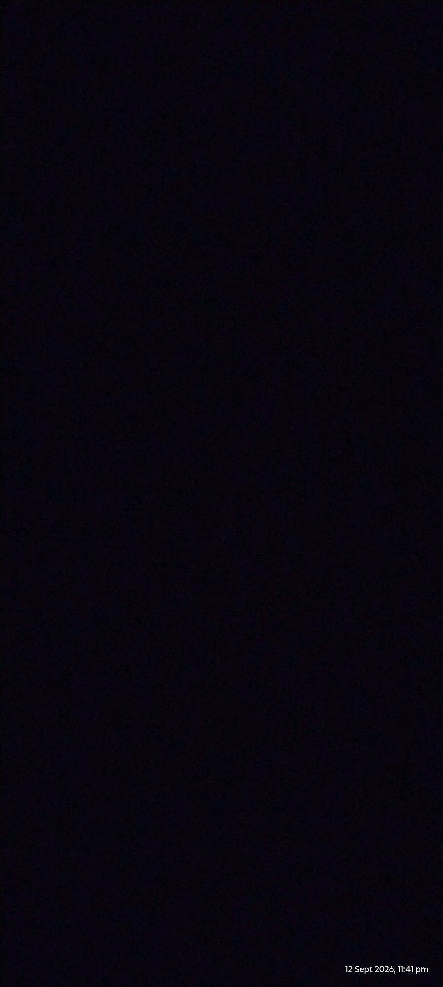 The image is a completely black frame with a timestamp in the bottom right corner that reads "12 Sept 2026, 11:41 pm". There are no discernible objects, people, actions, or environmental details visible in the image. Therefore, it is impossible to provide any information about the location in Yavatmal, India, or any forensic details of a scene.