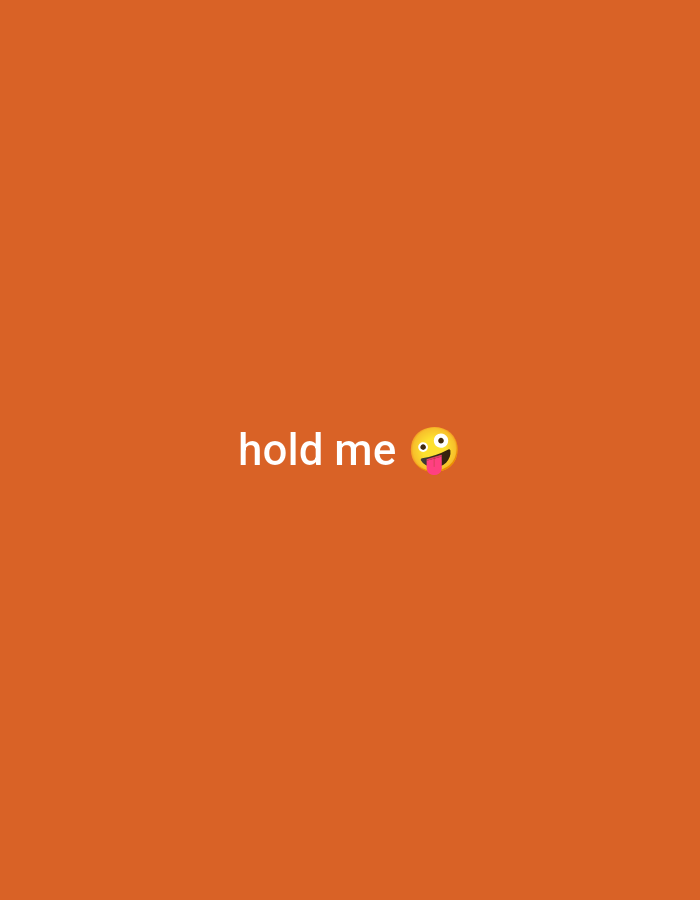 The image displays a plain orange background with the words "hold me" written in white text. To the right of the text is a yellow emoji with a tongue sticking out. The overall scene is minimalist and likely a digital image or graphic. There are no discernible environmental details or city locations present.