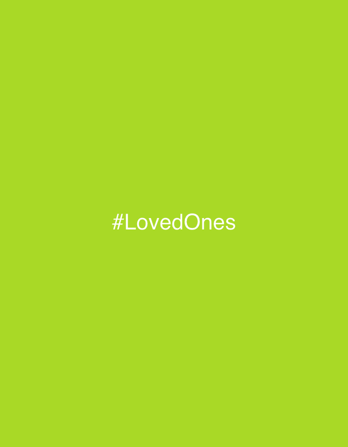 The image is a digital graphic with a solid, vibrant lime green background. Centered horizontally and slightly below the vertical midpoint of the image, the text "#LovedOnes" is displayed in white, sans-serif lettering. No other subjects, objects, or activities are visible. The background is completely uniform in color, lacking any discernible textures, patterns, or gradients. The graphic is minimalist and clear, focusing solely on the hashtag against the bright green backdrop. The location context provided for this media is Plovdiv, Bulgaria.