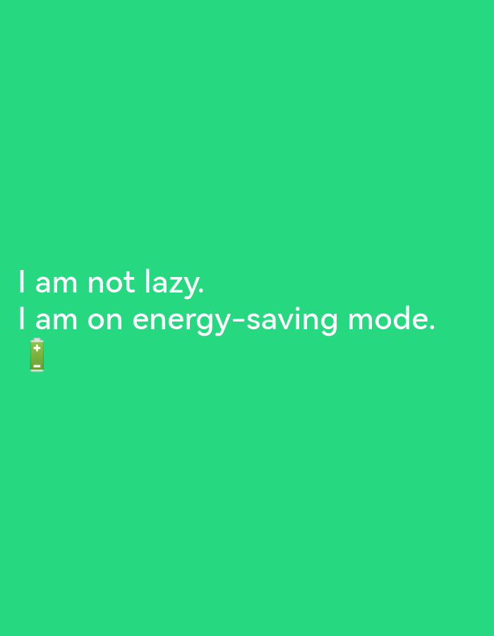 The image is a meme with text overlaid on a green background. The text reads "I am not lazy." and "I am on energy-saving mode." accompanied by a low battery emoji. There are no elements in the image to suggest a location in Lagos, Nigeria, or any specific environmental details.
