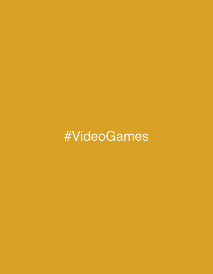 The image features a solid mustard-yellow background with the hashtag "#VideoGames" in white text centered horizontally and vertically on the canvas. There is no indication of a location in Gijón/Xixón, Spain, or any other specific location, people, subjects, objects, actions, interactions, or environmental details beyond the color and text.
