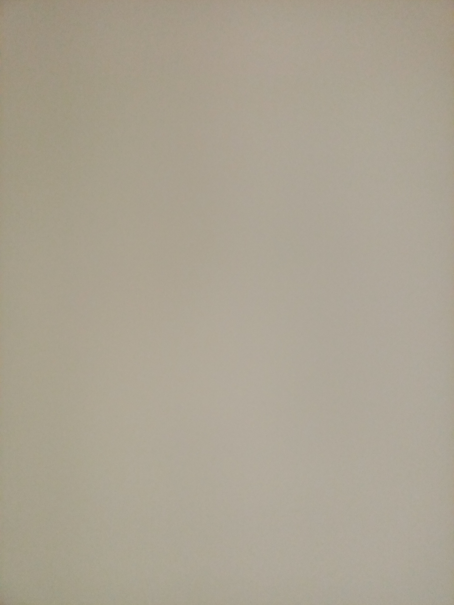 The image is a plain, light beige background with a subtle grainy texture. There are no discernible objects, people, or actions visible in the photograph. The lighting appears even and diffuse, casting no shadows. The image is a solid color, lacking any details that would suggest a specific location within Rostov-on-Don, Russia, or any other place.