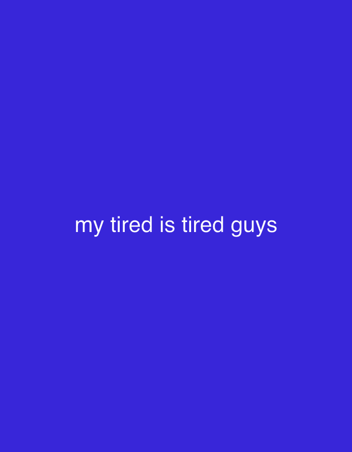 The image displays a solid, uniform royal blue background. Centrally positioned on this background is white, sans-serif text that reads: "my tired is tired guys". No other subjects, objects, people, actions, or interactions are present. The environment is an abstract, flat blue field, devoid of any physical landscape or architectural features typically found in a city like Abuja, Nigeria.
