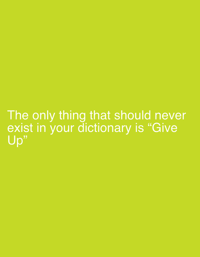 A motivational quote is displayed in white text against a bright lime green background. The quote reads, "The only thing that should never exist in your dictionary is "Give Up"." The text is centered on the screen, with the first line spanning the width of the image and the second line centered below it.