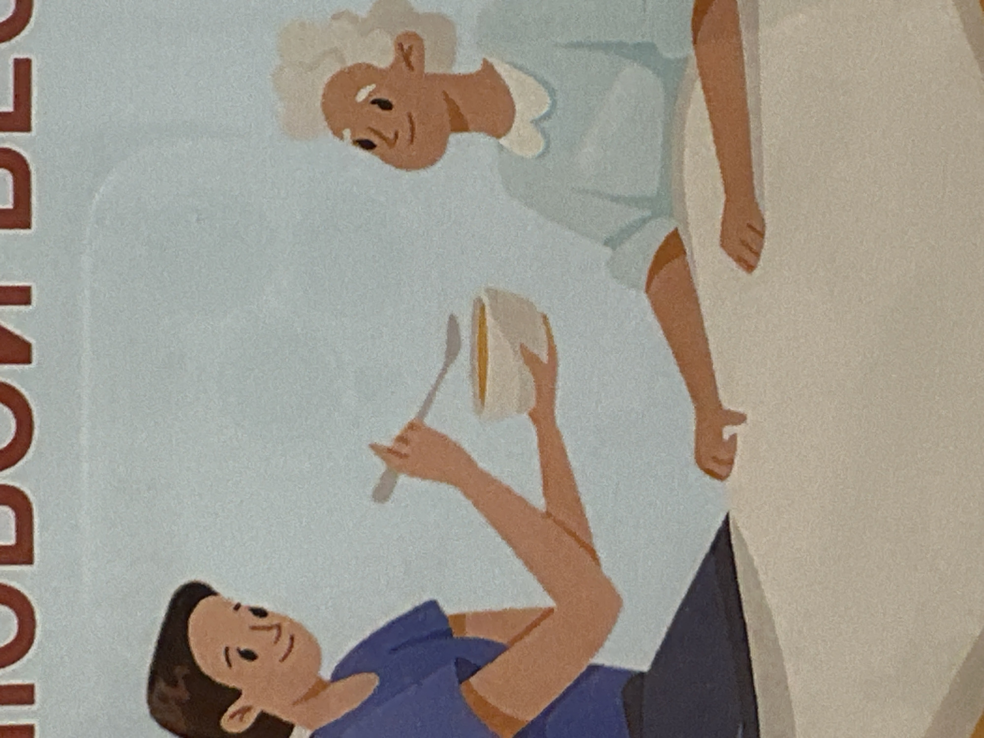 The image shows a cartoon illustration of a young person feeding an elderly person. The younger person, with short dark hair and wearing a blue shirt, is holding a bowl of food and a spoon, offering it to the elder. The elder, with white curly hair and wearing a light blue shirt, is looking towards the spoon. They are both sitting at a table, which is covered with a light-colored tablecloth. The background is a plain light blue. There are no elements in the image that indicate a specific location in the city of Minsk, Belarus.