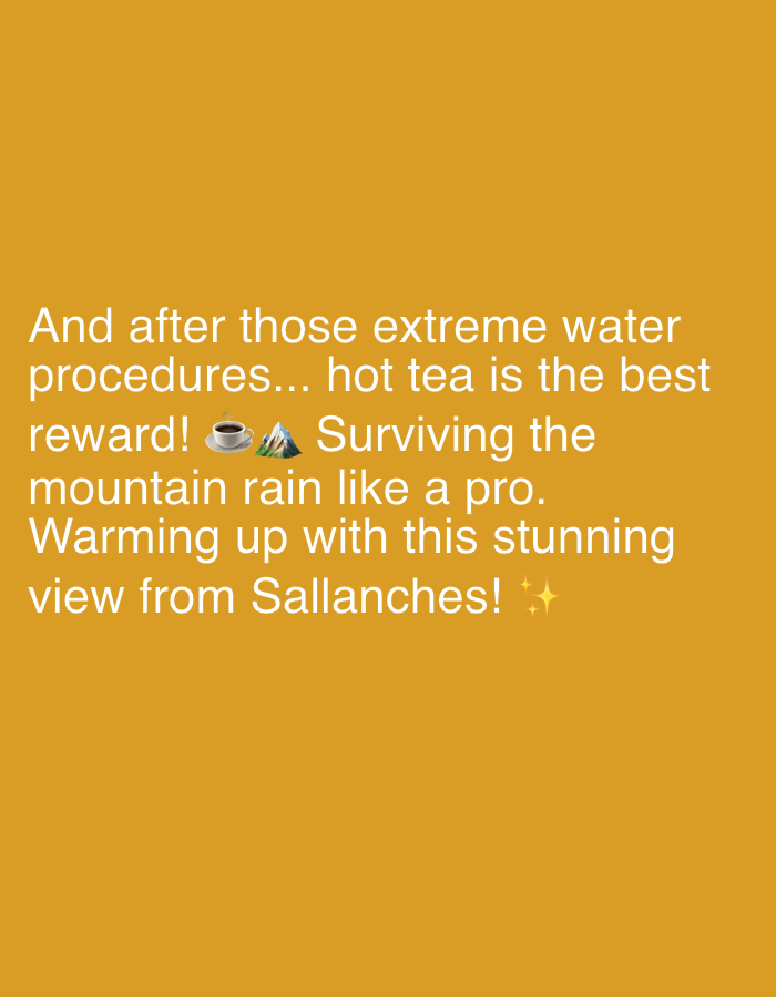 The image shows a plain orange background with white text. The text reads: "And after those extreme water procedures... hot tea is the best reward! ☕⛰️ Surviving the mountain rain like a pro. Warming up with this stunning view from Sallanches! ✨" The text is centered on the image and is of varying sizes. There are no people or objects present in the image. The location of Domancy, France is not depicted or mentioned in the image, only the town of Sallanches, which is near Domancy.