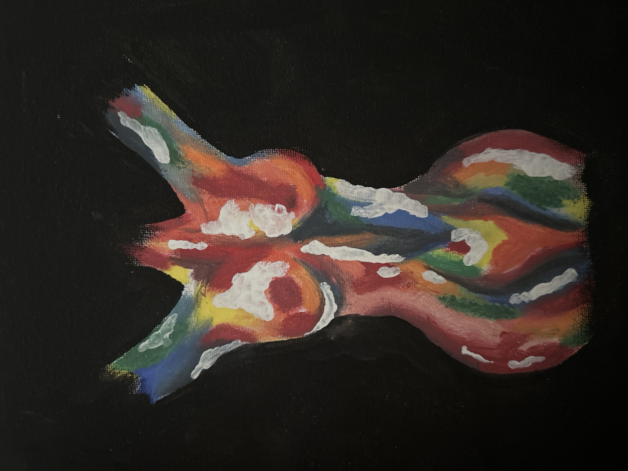 The image is a painting on a black canvas depicting a stylized, colorful human torso against a solid black background. The torso is rendered in vibrant hues of red, orange, yellow, green, blue, and white, with the colors applied in broad strokes that create a sense of form and light. The background is uniformly black, providing a stark contrast to the colorful subject. The painting is centered within the frame, with ample black space surrounding the torso. There is no discernible location in a city.