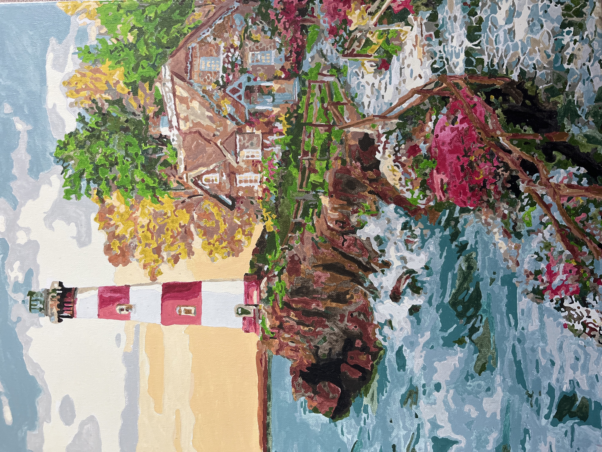 The image depicts a painting of a lighthouse and a house situated on a rocky coastline. The lighthouse is tall and cylindrical, with alternating red and white stripes. It stands on a cliff overlooking a turbulent sea. To the right of the lighthouse, a quaint house with a thatched roof is nestled amongst lush greenery and vibrant pink flowers. A stone path with wooden railings leads towards the house. The sky above is partly cloudy, with a warm orange glow suggesting either sunrise or sunset. The overall scene evokes a sense of peaceful solitude and natural beauty. There is no information about the city of Vvedenka, Ukraine, in the provided image or its description.