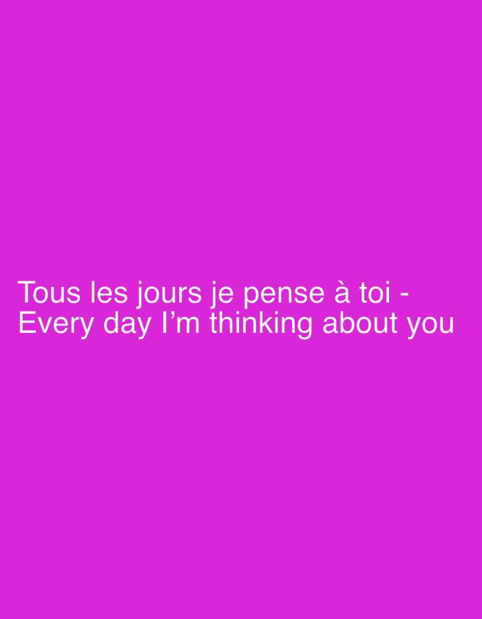 The image is a photograph with a solid magenta background. White text is displayed in the center of the image. The text reads: "Tous les jours je pense à toi - Every day I'm thinking about you." There are no people, objects, or any discernible environmental features other than the solid color background and the text. The image does not contain any information that would allow for its location to be identified as Saint-Imier, Switzerland.