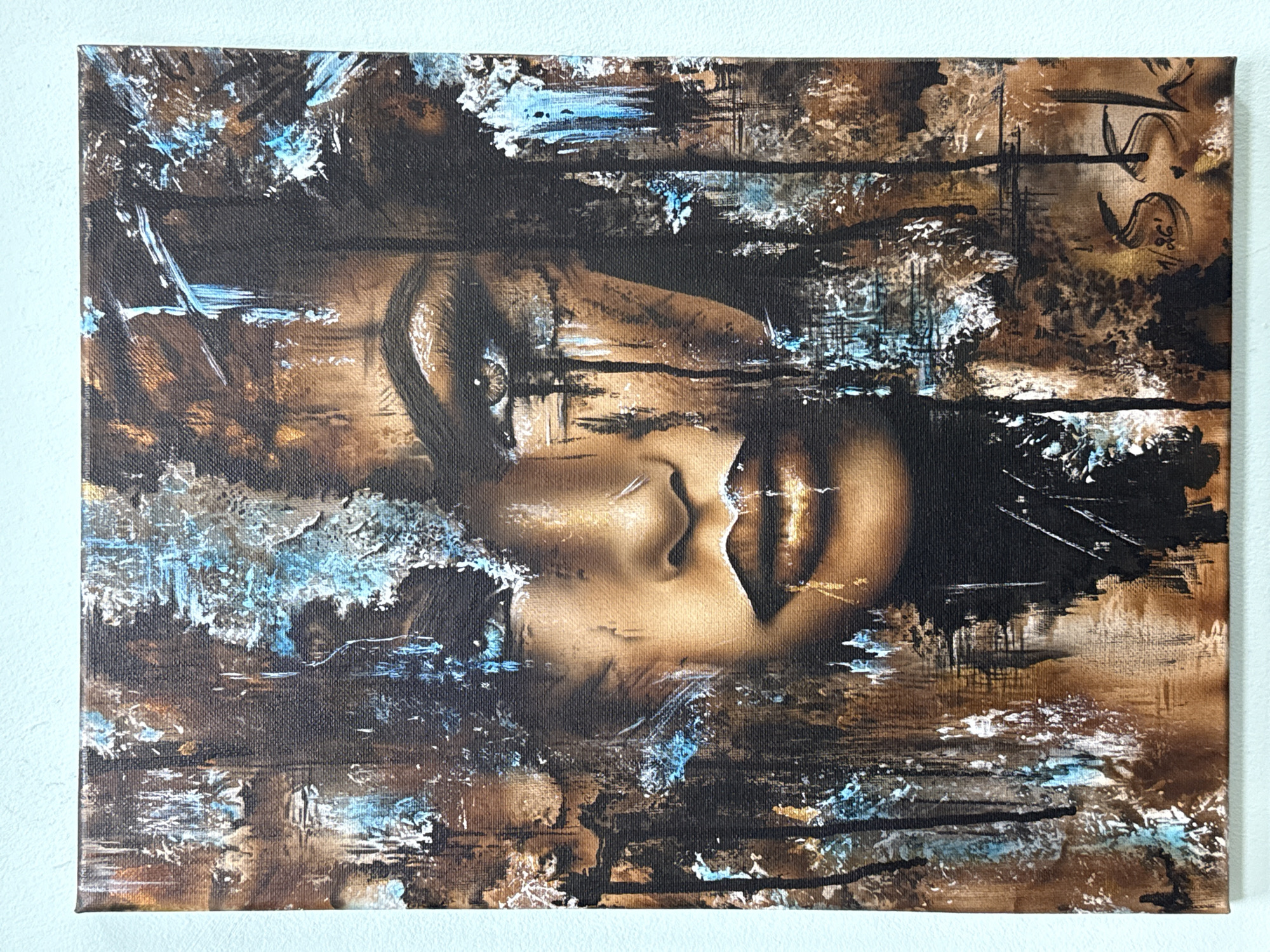 The image is a square canvas painting. The painting depicts a human face in an abstract style. The face is positioned sideways and appears to be female. The dominant colors are browns, blacks, and hints of blue. The face is rendered in shades of brown with highlights suggesting light sources. The surrounding area is characterized by textured strokes of black, brown, and blue, which create an abstract and somewhat chaotic background. There are some linear elements in black that seem to run horizontally across the painting, partially obscuring and fragmenting the face. The style is reminiscent of modern abstract or impressionistic portraiture. There is no information in the image that relates to Burgas, Bulgaria.