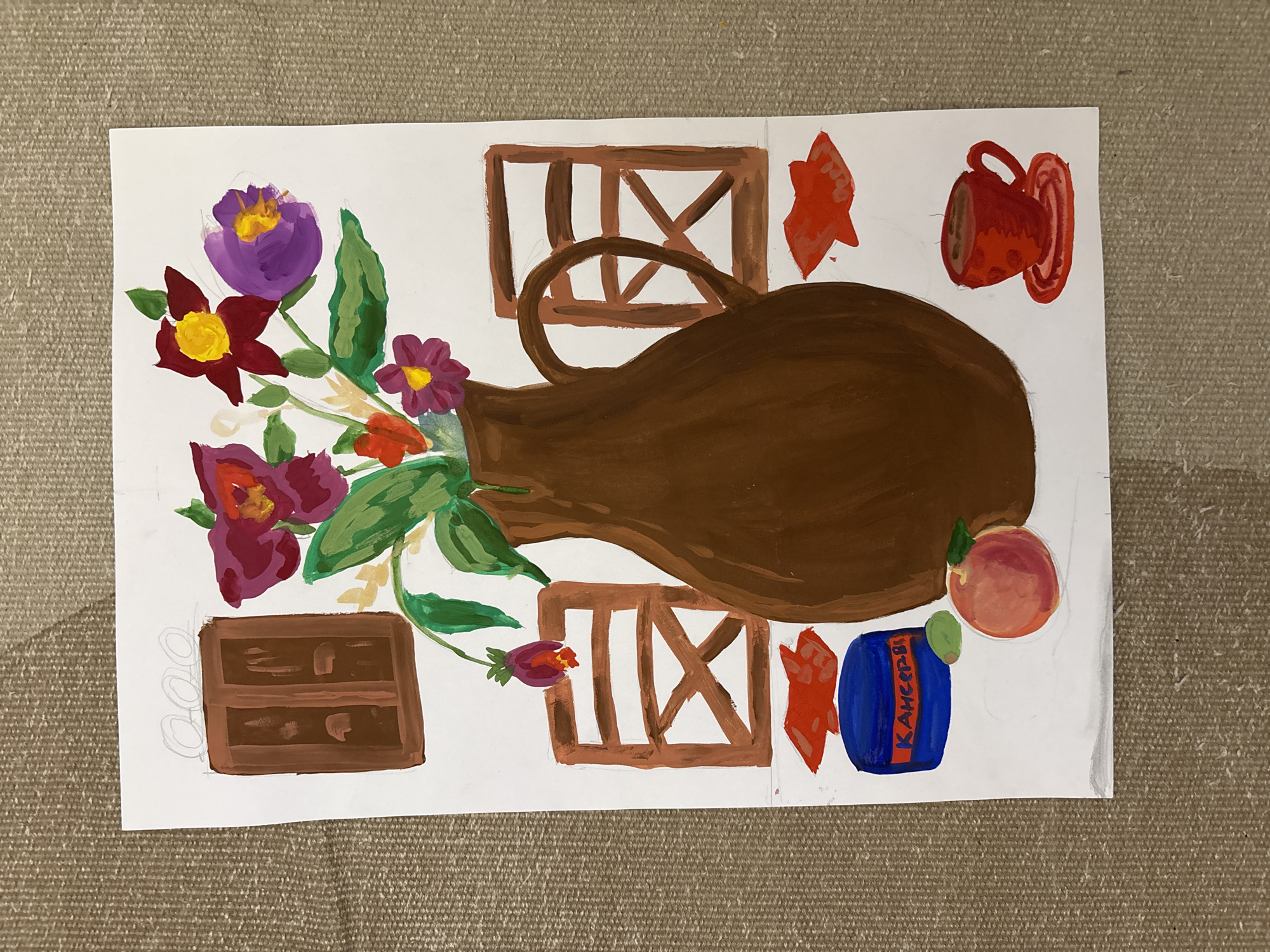 The image is a painting on white paper depicting a still life. A large, brown jug dominates the center, holding a bouquet of colorful flowers in shades of purple, red, and yellow with green leaves. Other objects surround the jug: a peach, a blue can with Cyrillic text, a red mug, and brown rectangular shapes that may represent furniture or architectural elements. The composition appears to be amateur or child-like in style. There is no visual information present to indicate the location is Saint Petersburg, Russia.