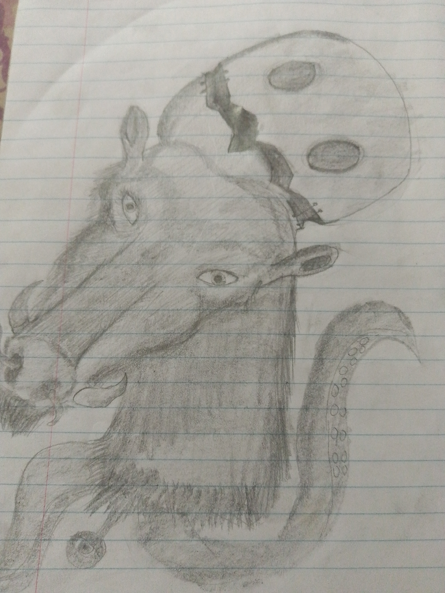 The image is a pencil drawing on lined paper. The drawing depicts a hybrid creature with the head of a horse, a tentacle protruding from its body, and a cracked spherical object with two dark circles attached to its head. The creature has visible eyes, ears, and facial features resembling a horse. The tentacle is curved and displays circular patterns. The background is plain lined paper. No location information relating to Juan Griego, Venezuela is present or inferable from the image.