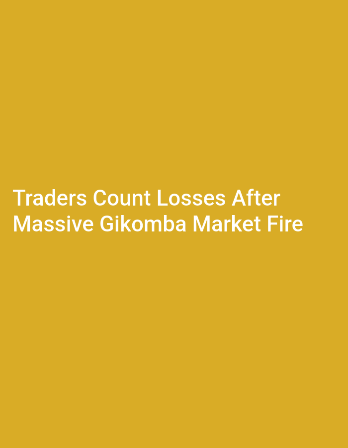 The media file shows white text on a mustard-yellow background. The text reads: "Traders Count Losses After Massive Gikomba Market Fire". The image is a static graphic, likely a news headline or social media post. There are no visual elements beyond the text and the solid color background. The event described in the text is a fire at Gikomba Market, implying a significant loss for traders. The location context is Nairobi, Kenya, which is known to have a large market named Gikomba, often susceptible to fires. The text itself conveys a sense of urgency and unfortunate news. No other details such as time of day, weather, or emotions are depicted visually.