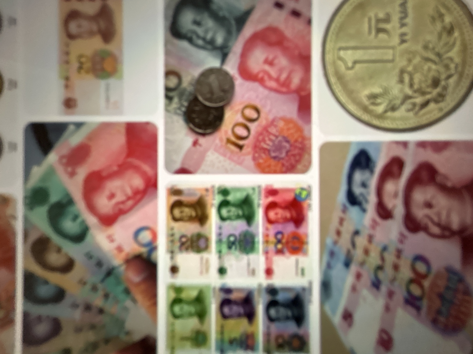 The image displays a collection of Chinese Yuan banknotes and coins. In the upper left quadrant, a hand is shown holding several colorful banknotes. To the right of this, a single 20 Yuan banknote is visible. Below these, a grid of six banknotes is arranged, featuring denominations of 1, 20, 50, and 100 Yuan. The central right portion of the image shows two coins resting on a 100 Yuan banknote, with a larger portion of the banknote featuring a portrait of Mao Zedong. The bottom left section features a stack of 100 Yuan banknotes. Finally, the bottom right corner prominently displays a single 1 Yuan coin. The image is not specific to Gelendzhik, Russia.