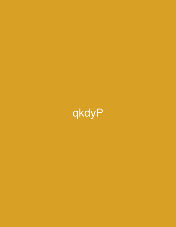 The image displays a uniform mustard yellow background. Centrally positioned on this monochromatic field is the white text "qkdyP," rendered in a sans-serif typeface. No individuals, additional objects, actions, or environmental details are discernible within the frame. This scene is located in the city of Casablanca, Morocco.