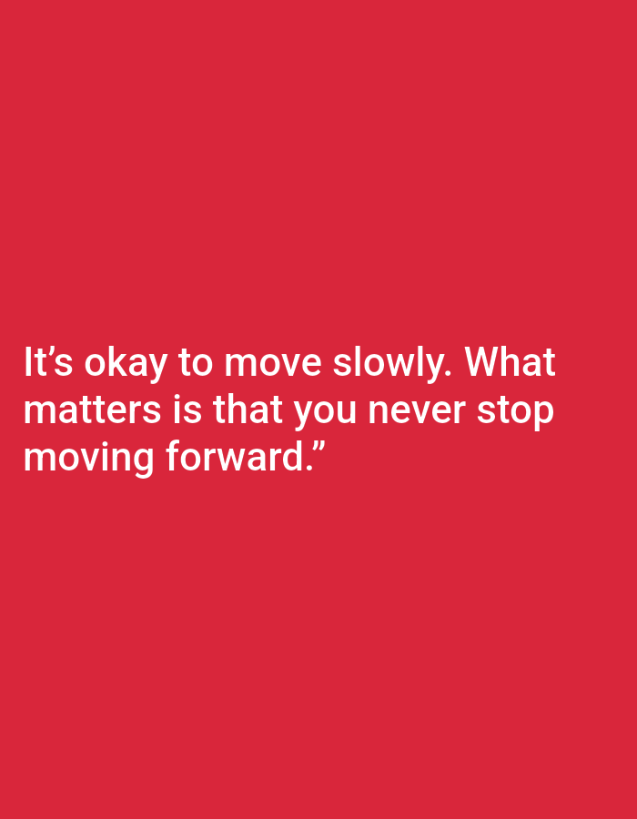 A red background features white text that reads: "It's okay to move slowly. What matters is that you never stop moving forward." There are no people, subjects, objects, actions, interactions, or environmental details present in the image, as it is a simple text overlay on a solid color. The location in Kota Negara Timur, Indonesia, is not depicted or suggested by the image.